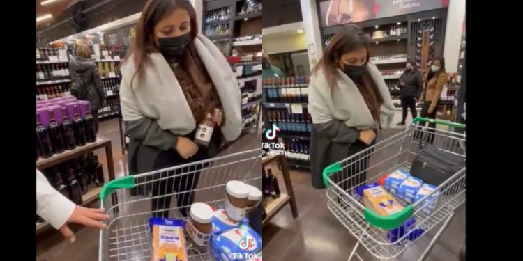 Mujer robando en supermercado
